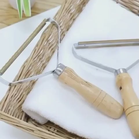 Close look at the copper coil head and wood handle
