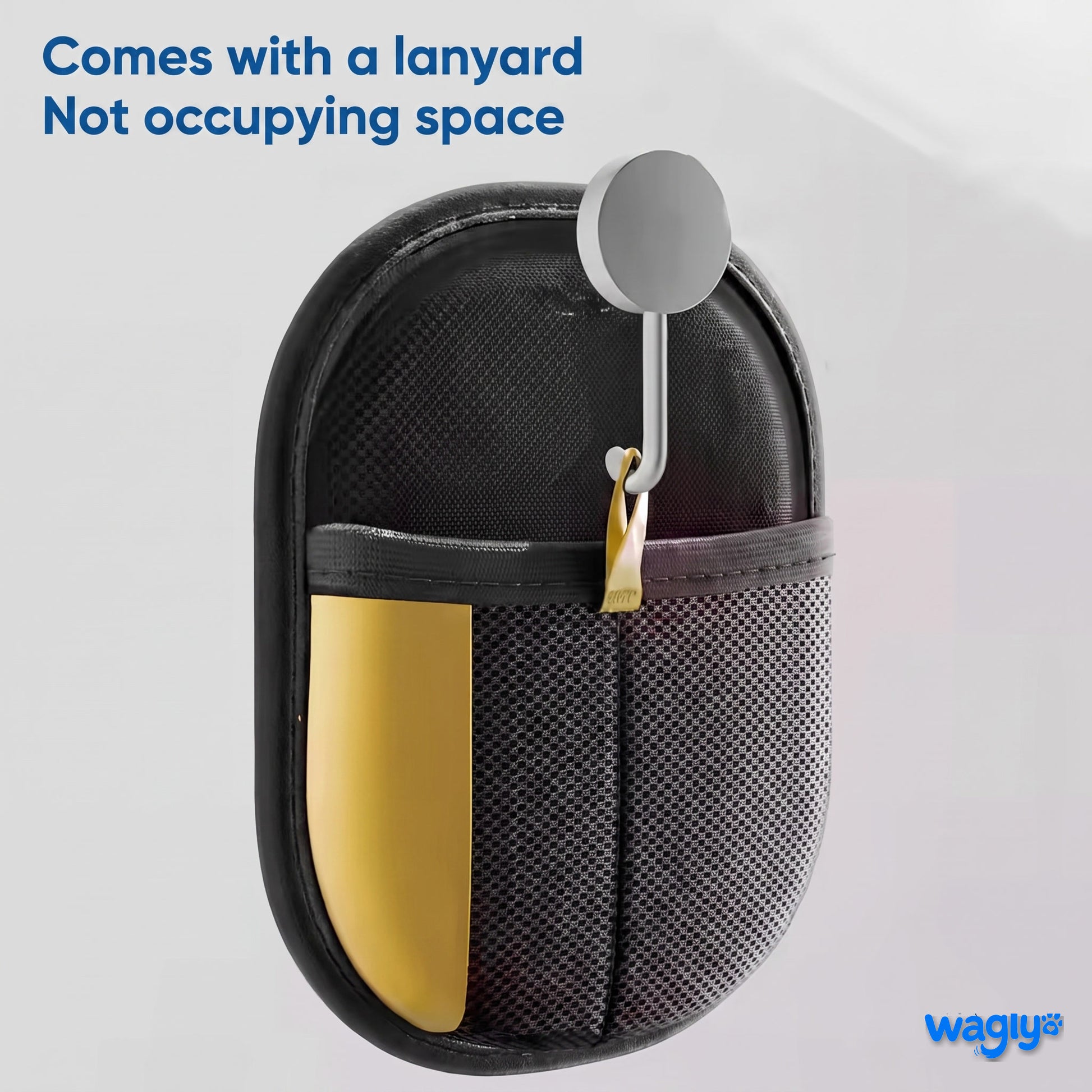 The Wagly glove hanging from its lanyard on a wall hook, taking up no space